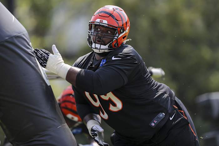 Cincinnati Bengals defensive tackle Tyler Shelvin (99) runs drills during training camp at Paul Brown Stadium.